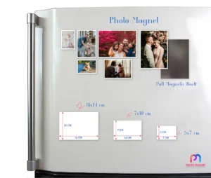 Custom Photo Magnets Custom photo magnets in three different sizes (14x10, 10x7, 7x5 cm) displayed on a fridge, highlighting the full magnetic back feature.
